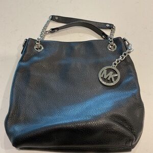 Michael Kors Black Bag with silver hardware.